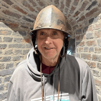 Robert trying out one of the helmets on display inside the King's Lynn South Gate