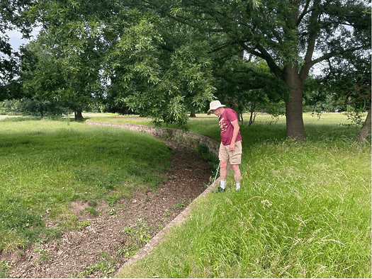 Robert inspecting the ha-ha at Beningbrough Hall